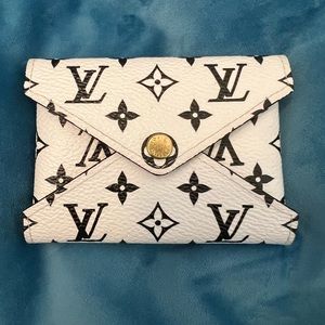 Authentic Louis Vuitton Limited Edition small Kirigami Pochette